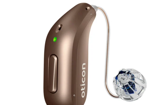 Oticon Intent Mini RITE hearing aid in chestnut brown.