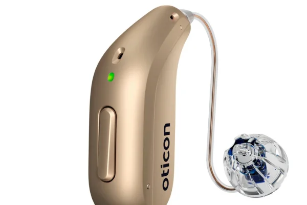 Oticon Intent Mini RITE hearing aid in honey beige.